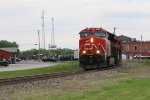 CN 3142 rolls through the sweeping curve leading M397 west